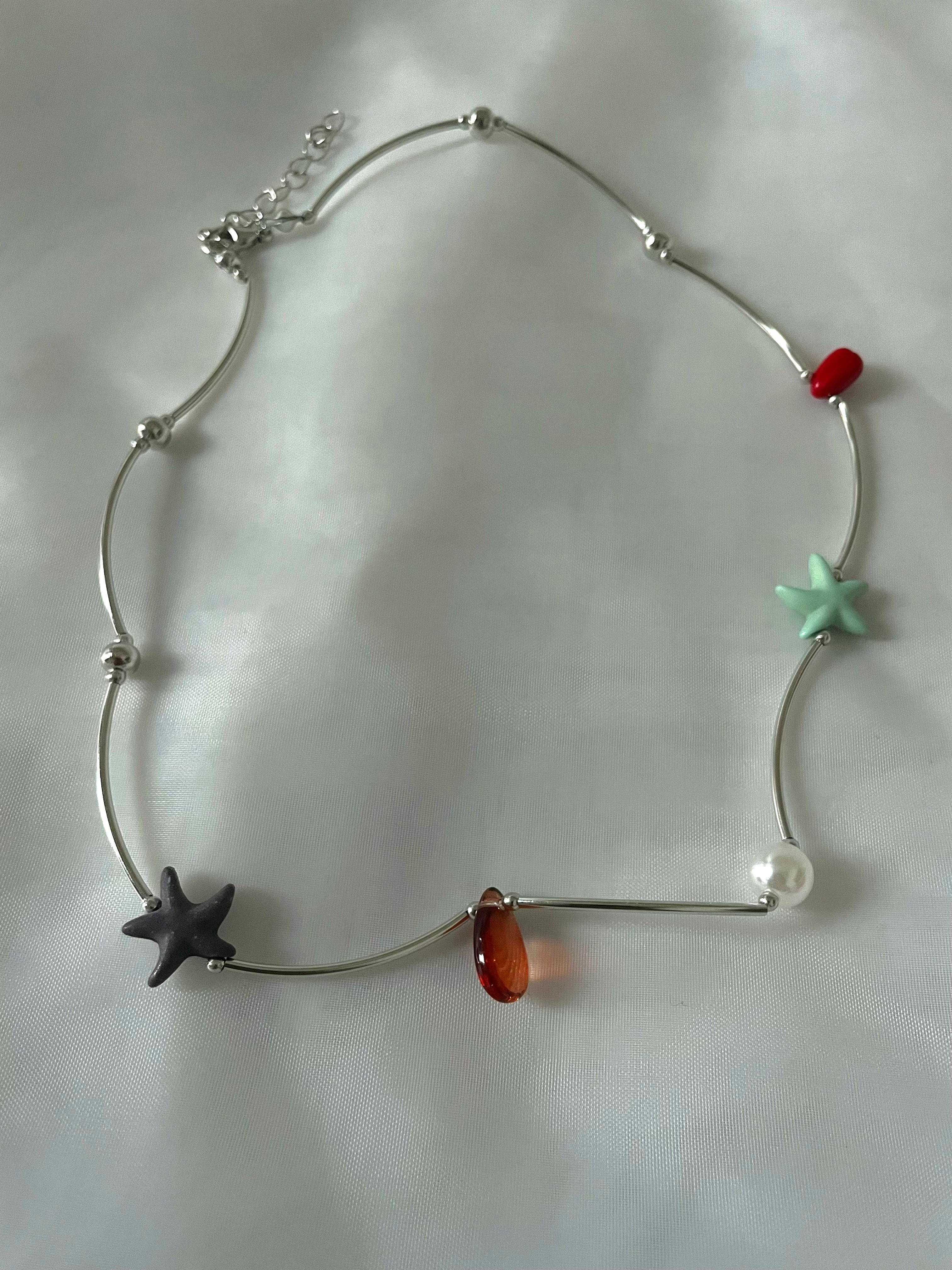 Whimsical Sea Star Spectrum Necklace